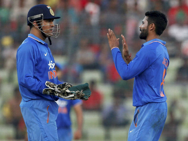 Dhoni (left) celebrates with Jadeja during the match Dhoni (left) celebrates with Jadeja during the match