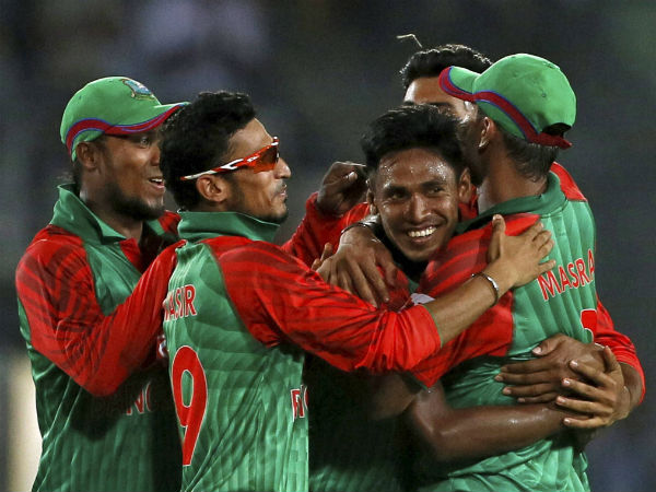Mustafizur Rahman (centre), celebrates a wicket with team-mates Mustafizur Rahman (centre), celebrates a wicket with team-mates