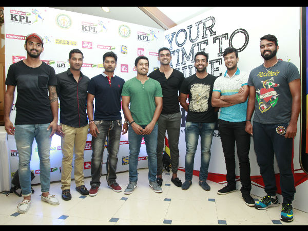 Karnataka captain R Vinay Kumar (3rd left) along with other players pose for photographers at the launch event Karnataka captain R Vinay Kumar (3rd left) along with other players pose for photographers at the launch event
