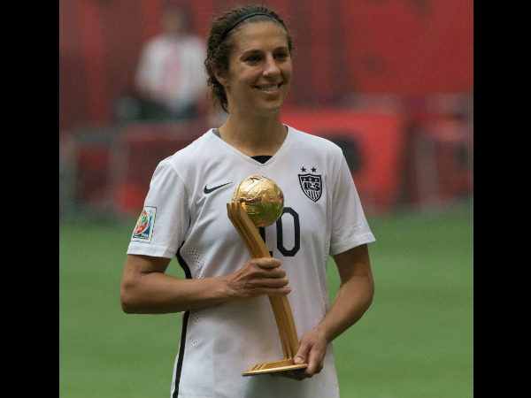 Carli Lloyd holds her Golden Ball award Carli Lloyd holds her Golden Ball award