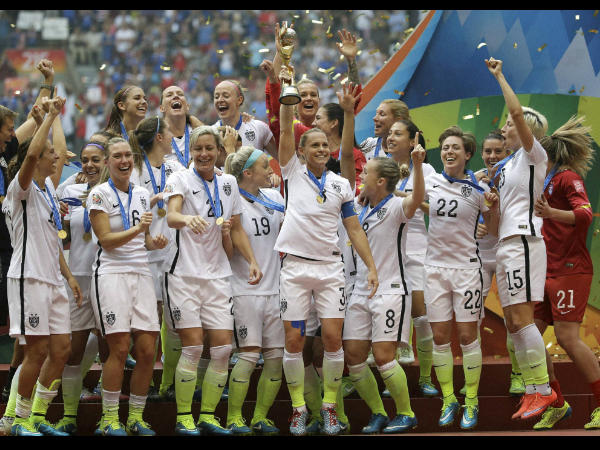 United States' players celebrate with the trophy United States' players celebrate with the trophy