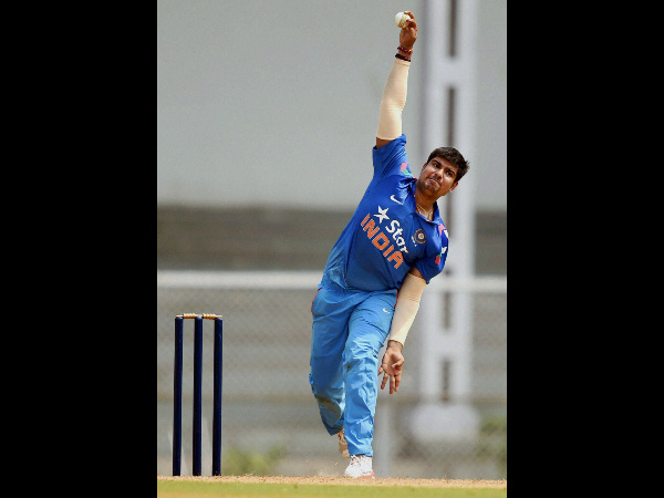 File photo of Karn Sharma bowling in a ODI File photo of Karn Sharma bowling in a ODI
