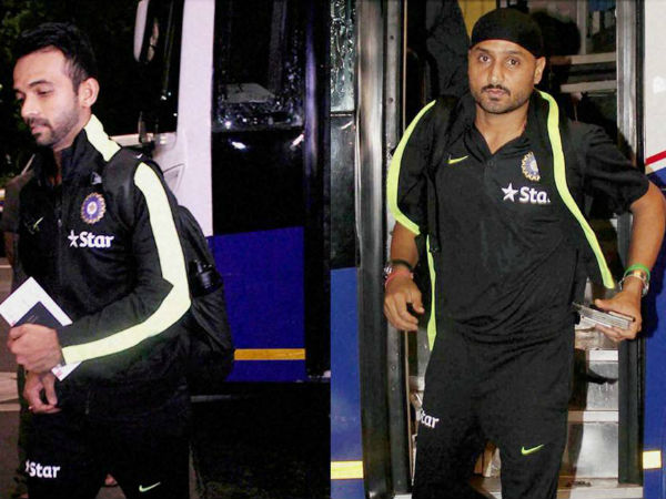 India captain Ajinkya Rahane (left) and Harbhajan Singh arrive at International Airport in Mumbai on Tuesday to depart for Zimbabwe India captain Ajinkya Rahane (left) and Harbhajan Singh arrive at International Airport in Mumbai on Tuesday to depart for Zimbabwe