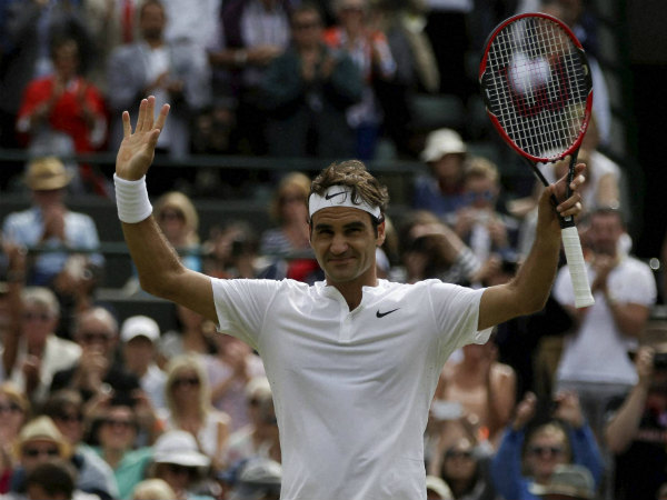 Roger Federer of Switzerland celebrates after winning the quarterfinal singles match against Gilles Simon of France Roger Federer of Switzerland celebrates after winning the quarterfinal singles match against Gilles Simon of France