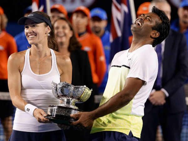 Hingis and Paes with Australian Open trophies earlier this year Hingis and Paes with Australian Open trophies earlier this year