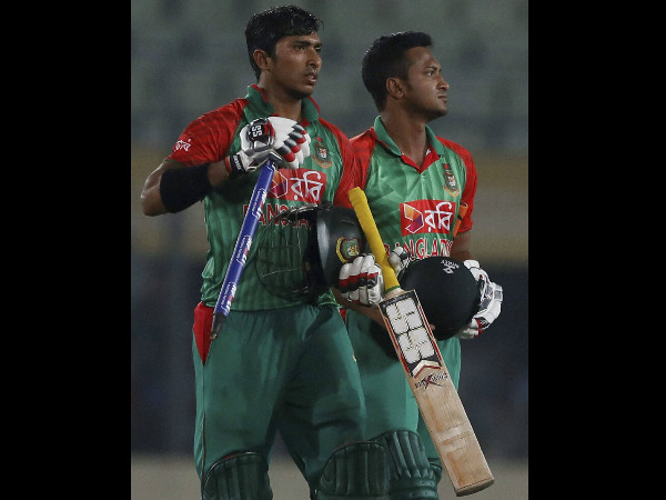 Soumya Sarkar, left, and Shakib Al Hasan return to the pavilion after the win Soumya Sarkar, left, and Shakib Al Hasan return to the pavilion after the win