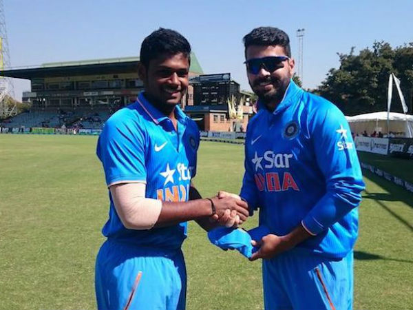 Samson receives his India cap from Vijay. Photo from BCCI's Twitter page Samson receives his India cap from Vijay. Photo from BCCI's Twitter page