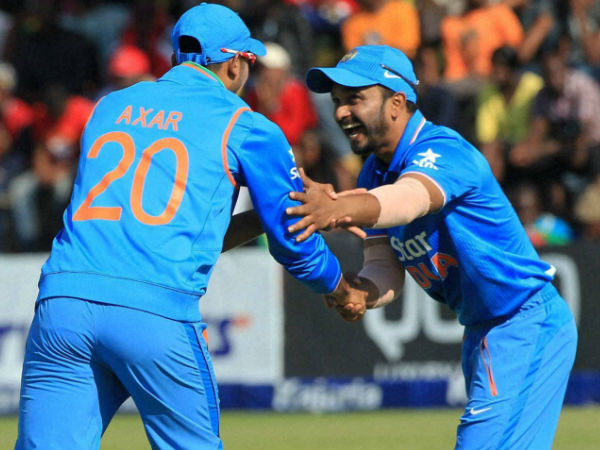 Axar and Jadhav celebrate a wicket Axar and Jadhav celebrate a wicket