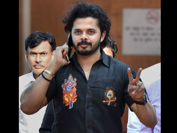 Sreesanth flashes 'V' sign as he comes out of Patiala House Courts on Saturday in Delhi Sreesanth flashes 'V' sign as he comes out of Patiala House Courts on Saturday in Delhi