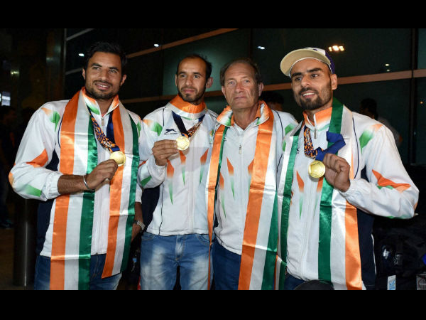 File photo: Gurbaj Singh (left), Indian hockey team's high performance director Roelant Oltman (2nd right), Ramandeep Singh and Gurwinder Singh Chandi (right) pose with their Asian Games gold medals upon arrival at IGI airport New Delhi on October 5, 2014 File photo: Gurbaj Singh (left), Indian hockey team's high performance director Roelant Oltman (2nd right), Ramandeep Singh and Gurwinder Singh Chandi (right) pose with their Asian Games gold medals upon arrival at IGI airport New Delhi on October 5, 2014