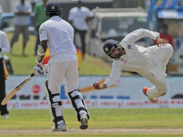 Rohit Sharma takes a stunning catch at short-leg to dismiss Angelo Mathews off Ashwin Rohit Sharma takes a stunning catch at short-leg to dismiss Angelo Mathews off Ashwin