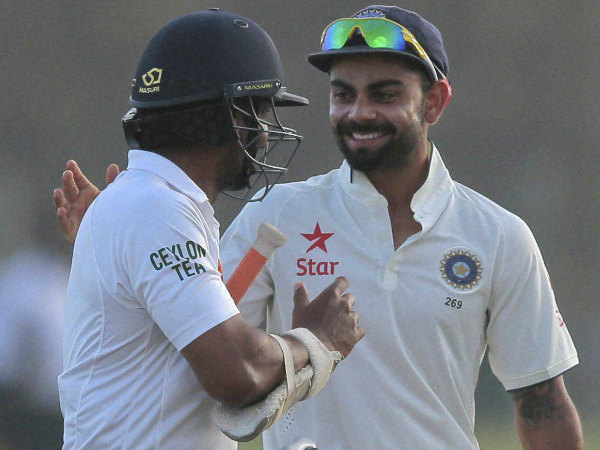 Kohli (right) and Sangakkara during the 1st Test in Galle Kohli (right) and Sangakkara during the 1st Test in Galle