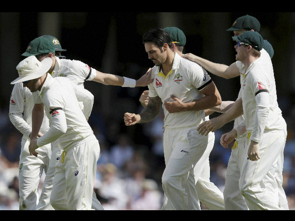 Mitchell Johnson, centre, celebrates taking the wicket of England’s Joe Root on the third day Mitchell Johnson, centre, celebrates taking the wicket of England’s Joe Root on the third day