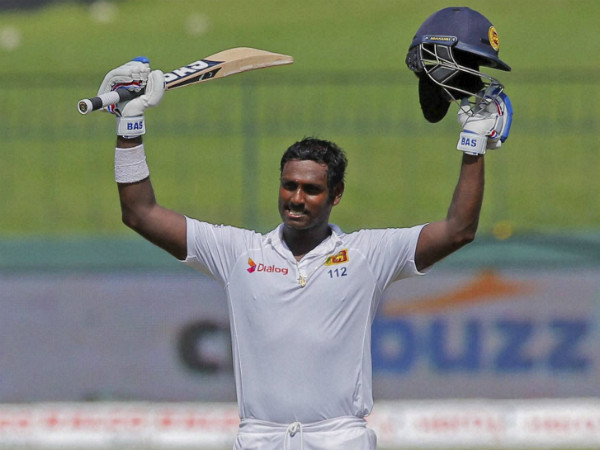 Mathews celebrates his century Mathews celebrates his century