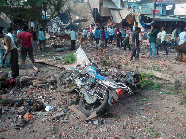Damaged motorcycles lying near a collapsed restaurant where a cooking gas cylinder exploded in Petlawad town in Jhabua district of Madhya Pradesh Damaged motorcycles lying near a collapsed restaurant where a cooking gas cylinder exploded in Petlawad town in Jhabua district of Madhya Pradesh