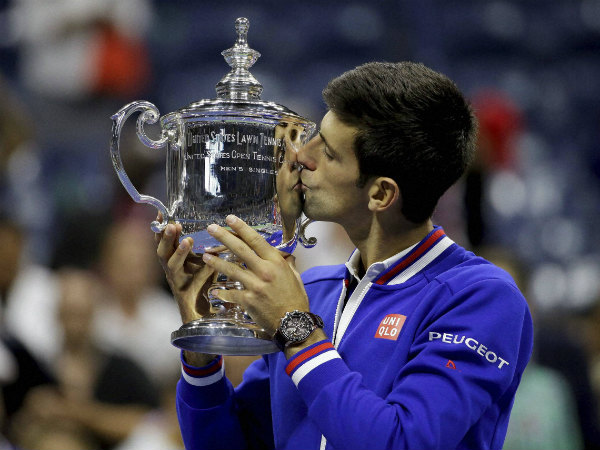 Djokovic kisses the US Open trophy after defeating Federer Djokovic kisses the US Open trophy after defeating Federer
