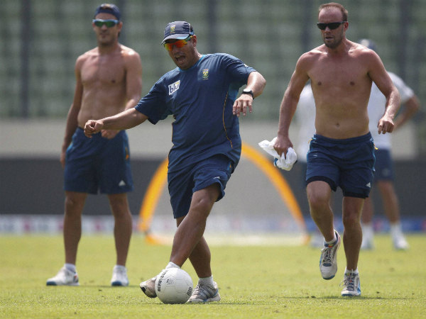 Russell Domingo, centre, plays a game of soccer with Faf du Plessis, left, and AB de Villiers in Dhaka in this file photo Russell Domingo, centre, plays a game of soccer with Faf du Plessis, left, and AB de Villiers in Dhaka in this file photo