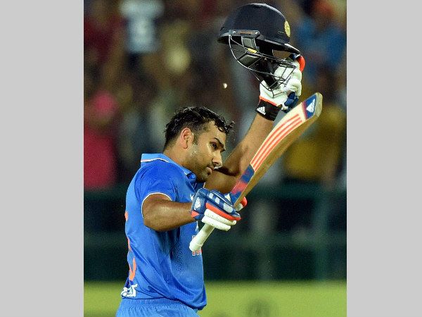 Rohit Sharma celebrates his maiden T20I ton Rohit Sharma celebrates his maiden T20I ton