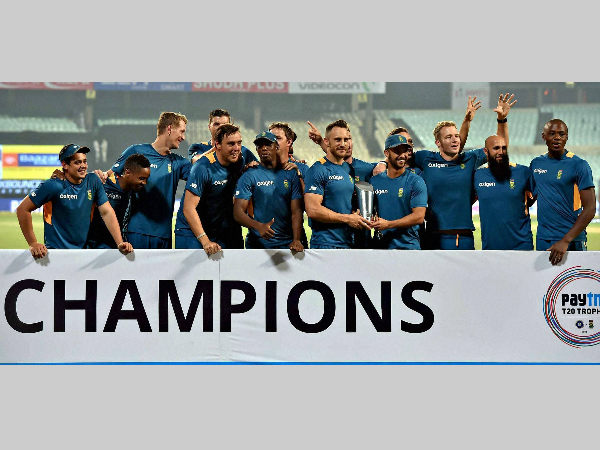 South African players celebrate with the trophy South African players celebrate with the trophy