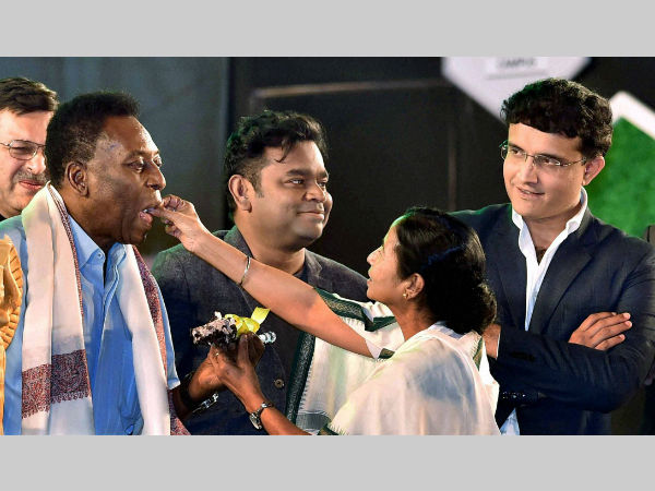 West Bengal CM Mamata Banerjee feeds a piece of cake to Pele with Sourav Ganguly and AR Rahman at a function in Kolkata on Monday evening West Bengal CM Mamata Banerjee feeds a piece of cake to Pele with Sourav Ganguly and AR Rahman at a function in Kolkata on Monday evening