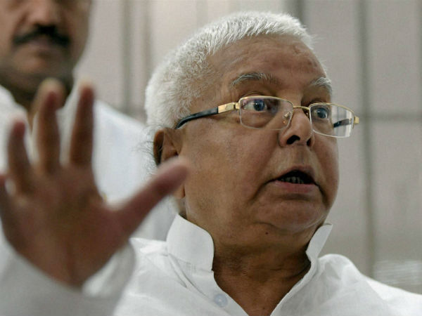 Bihar: Lalu Prasad Yadav escapes unhurt as portion of dais caves in. Bihar: Lalu Prasad Yadav escapes unhurt as portion of dais caves in.