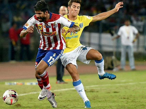 Atletico de Kolkata and Kerala Blasters FC (yellow) players in action during their ISL match Atletico de Kolkata and Kerala Blasters FC (yellow) players in action during their ISL match