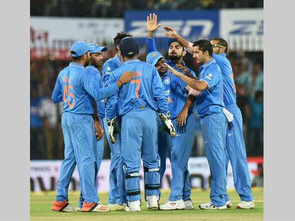 Indian players celebrate a wicket Indian players celebrate a wicket