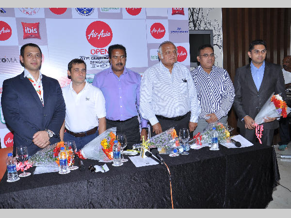 From left: Gaurav Rathore, Commericial Director, Air Asia India, Roberto Rainera, ATP Supervisor from Italy, BNS Reddy, Assistant Commissioner of Police and Treasurer, KSLTA, Ramaswami, Joint Secretary, KSLTA and Sunil Yajaman, Tournament Director at the media briefing of the Air Asia Open on Thursday. From left: Gaurav Rathore, Commericial Director, Air Asia India, Roberto Rainera, ATP Supervisor from Italy, BNS Reddy, Assistant Commissioner of Police and Treasurer, KSLTA, Ramaswami, Joint Secretary, KSLTA and Sunil Yajaman, Tournament Director at the media briefing of the Air Asia Open on Thursday.
