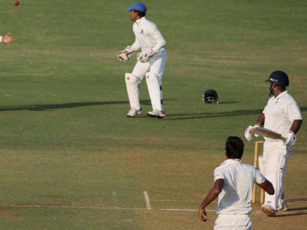 File photo: Batsman Ramesh Powar looks back as Bengal fielder drops a catch during a Ranji Trophy game File photo: Batsman Ramesh Powar looks back as Bengal fielder drops a catch during a Ranji Trophy game
