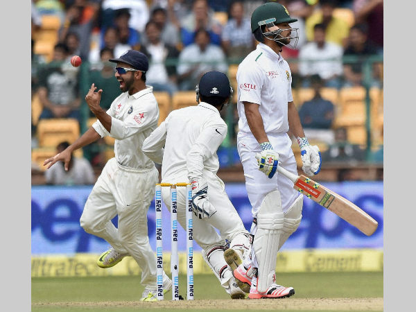 Rahane (left) exults after taking JP Duminy's (front) catch in Bengaluru Test on Saturday (November 14) Rahane (left) exults after taking JP Duminy's (front) catch in Bengaluru Test on Saturday (November 14)