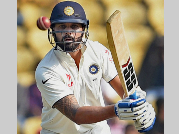 Vijay plays a shot. He top-scored for India with 40 Vijay plays a shot. He top-scored for India with 40