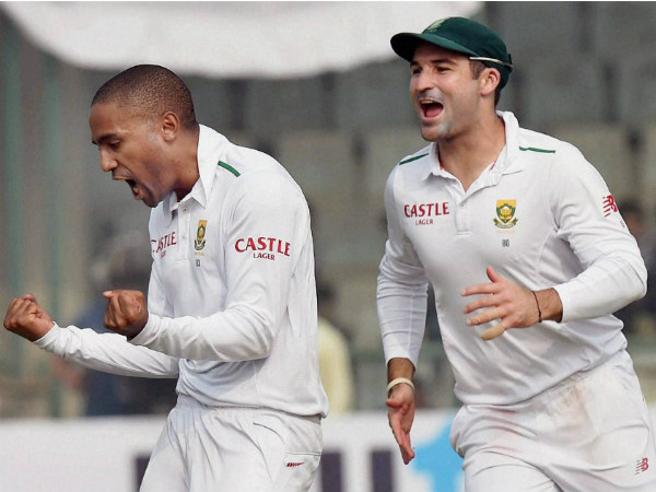 Piedt (left) celebrates with Elgar after dismissing Vijay Piedt (left) celebrates with Elgar after dismissing Vijay