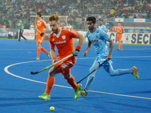 Players of India and Netherlands vie for the ball at the FIH Hockey World League Final in Raipur on Sunday. Players of India and Netherlands vie for the ball at the FIH Hockey World League Final in Raipur on Sunday.