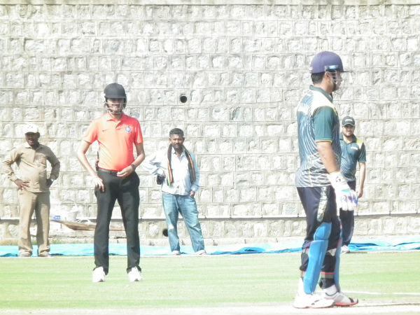 Indian umpire Paschim Pathak (2nd left) wears a helmet as he officiates in Kerala-Railways match during Vijay Hazare Trophy. Photos by Aprameya .C Indian umpire Paschim Pathak (2nd left) wears a helmet as he officiates in Kerala-Railways match during Vijay Hazare Trophy. Photos by Aprameya .C