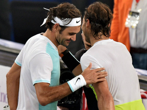 Federer (left) and Nadal greet each other after their match Federer (left) and Nadal greet each other after their match