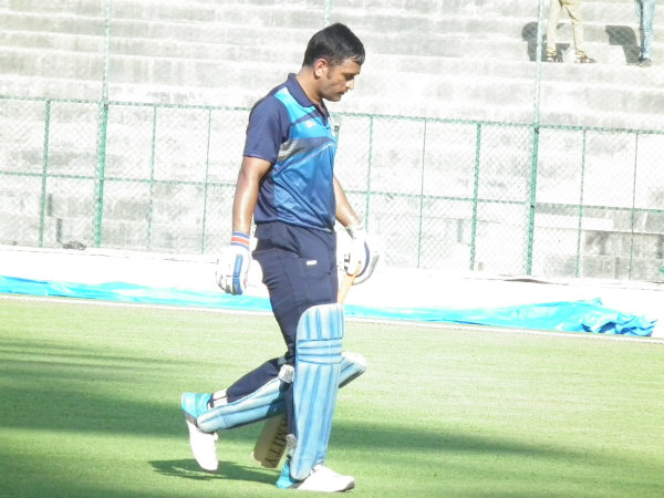 Dhoni walks back to the pavilion after scoring 18. Photo by Aprameya .C Dhoni walks back to the pavilion after scoring 18. Photo by Aprameya .C