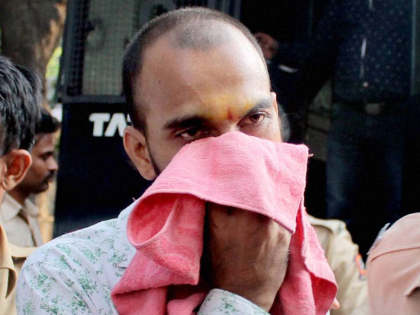 File Photo: Chandrabhan Sanap, accused of Software Engineer Esther Anuhya rape and murder case, is taken away after he was awarded death sentence in Mumbai. File Photo: Chandrabhan Sanap, accused of Software Engineer Esther Anuhya rape and murder case, is taken away after he was awarded death sentence in Mumbai.