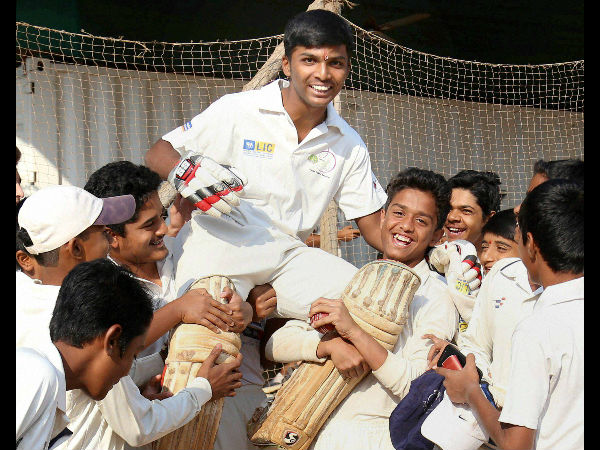 Pranav is hoisted by his team-mates and friends after his world record Pranav is hoisted by his team-mates and friends after his world record