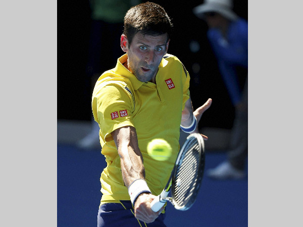 Djokovic makes a backhand return to Chung Hyeon of South Korea during their first round match at the Australian Open on Monday (January 18) Djokovic makes a backhand return to Chung Hyeon of South Korea during their first round match at the Australian Open on Monday (January 18)