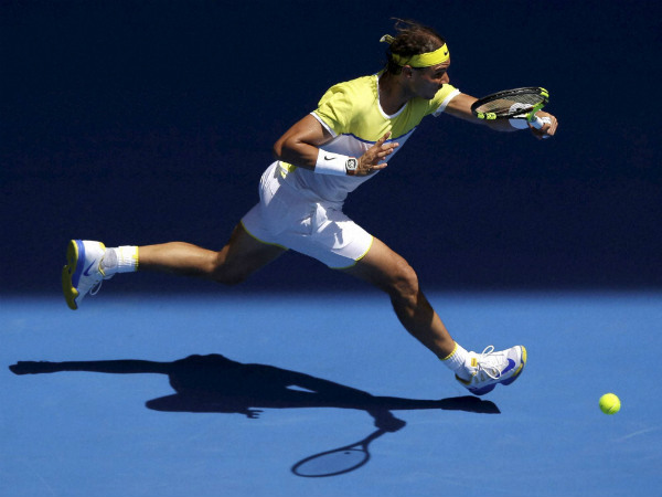 Nadal hits a return to Verdasco during their first round match at the Australian Open Nadal hits a return to Verdasco during their first round match at the Australian Open