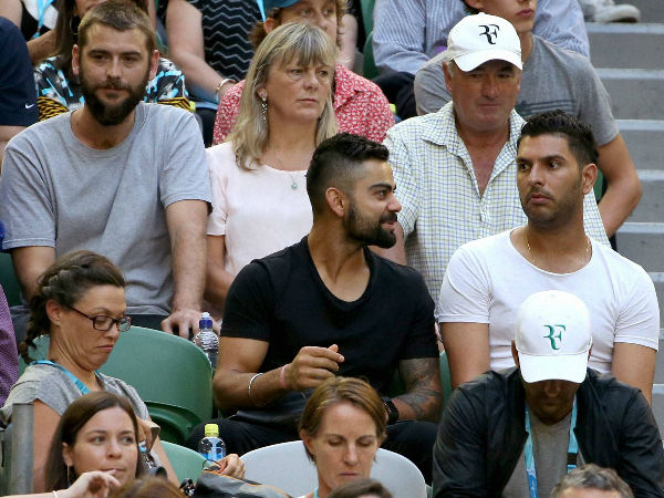 Second row from below: Indian cricketers Virat Kohli (black t-shirt) and Yuvraj Singh (right) watch the match in Melbourne Second row from below: Indian cricketers Virat Kohli (black t-shirt) and Yuvraj Singh (right) watch the match in Melbourne