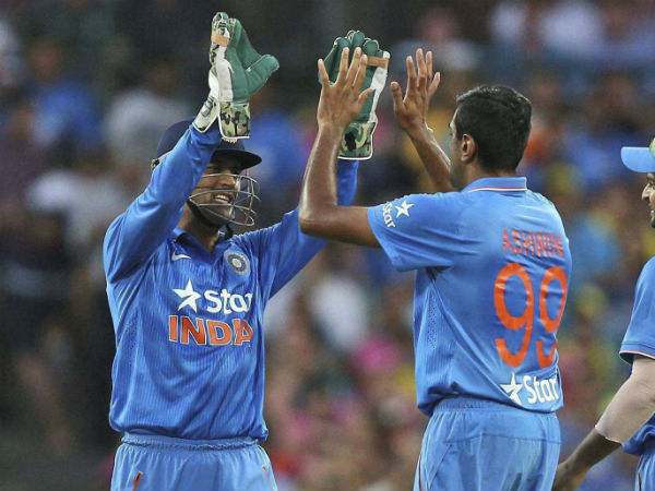 Dhoni (left) and Ashwin celebrate the dismissal of Shaun Marsh (not pictured) Dhoni (left) and Ashwin celebrate the dismissal of Shaun Marsh (not pictured)