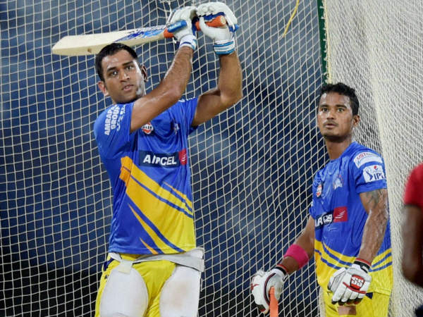 File photo: Pawan Negi (right) watches MS Dhoni bat at Chennai Super Kings' 'nets' in IPL File photo: Pawan Negi (right) watches MS Dhoni bat at Chennai Super Kings' 'nets' in IPL