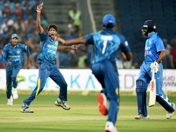 Kasun Rajitha (2nd left) celebrates the wicket of Indian batsman Ajinkya Rahane (not pictured) Kasun Rajitha (2nd left) celebrates the wicket of Indian batsman Ajinkya Rahane (not pictured)