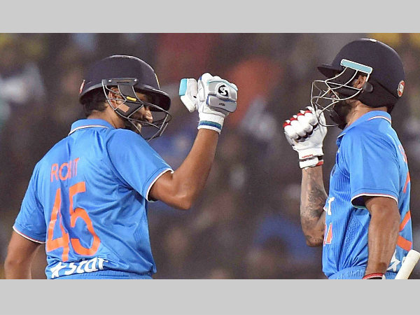 Rohit (left) and Shikhar react after their 50-run partnership Rohit (left) and Shikhar react after their 50-run partnership
