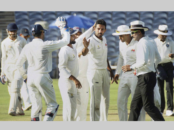 Dhawal Kulkarni (4th from right) and his team-mates celebrate a wicket in Ranji Trophy final Dhawal Kulkarni (4th from right) and his team-mates celebrate a wicket in Ranji Trophy final