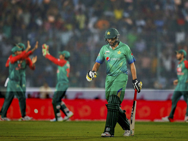 Pakistan captain Shahid Afridi walks back to the pavilion after getting out for duck against Bangladesh Pakistan captain Shahid Afridi walks back to the pavilion after getting out for duck against Bangladesh