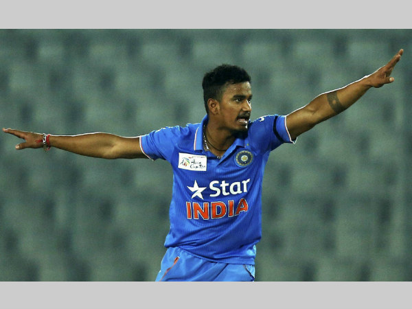 Pawan Negi appeals for a wicket during his debut against UAE Pawan Negi appeals for a wicket during his debut against UAE