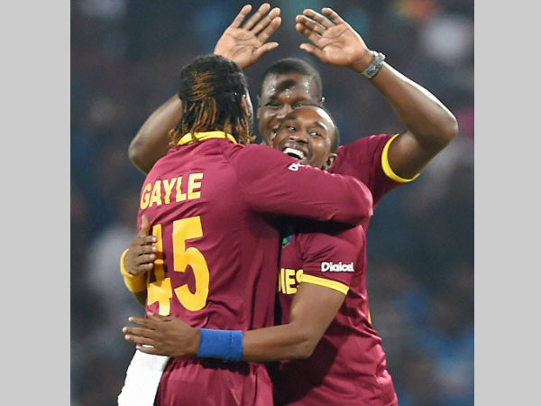 Chris Gayle (left) celebrates with his teammates after dismissing Rilee Rossouw during their World T20 match Chris Gayle (left) celebrates with his teammates after dismissing Rilee Rossouw during their World T20 match