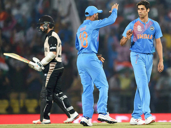 Nehra (right) celebrates a wicket with Kohli Nehra (right) celebrates a wicket with Kohli